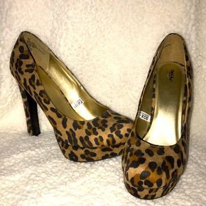 Size 8 1/2 leopard platform heels